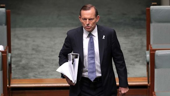 Prime Minister Tony Abbott arrives for Question Time on Tuesday. Photo: Alex Ellinghausen
