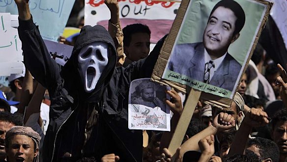 The largest protest so far ... in Yemen yesterday, and, bottom left and right, Khaled Said and Mohamed Bouazizi, the two men whose deaths in Egypt and Tunisia triggered the internet generation to revolt.