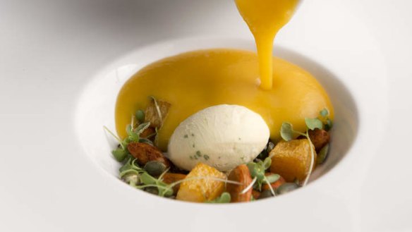 A butternut veloute is poured over sour cream and chive ice-cream.