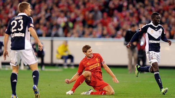 On target: Liverpool captain Steven Gerrard kicks the first goal for the visiting side at the MCG.