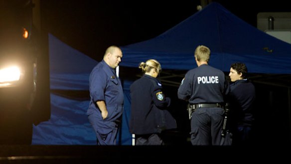 Crime scene... police last night outside the Cranbrook Avenue, Cremorne, house where Mr McGurk was shot.