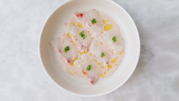 Snapper crudo, pickled green chilli and pomegranate vinaigrette.