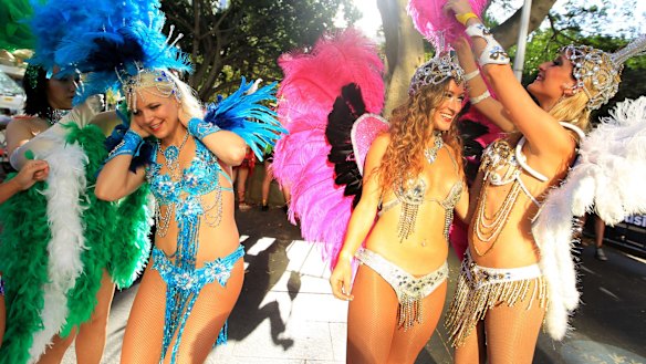 Participants prepare to put on a colourful show for the 2015 Mardi Gras at Hyde Park in Sydney.