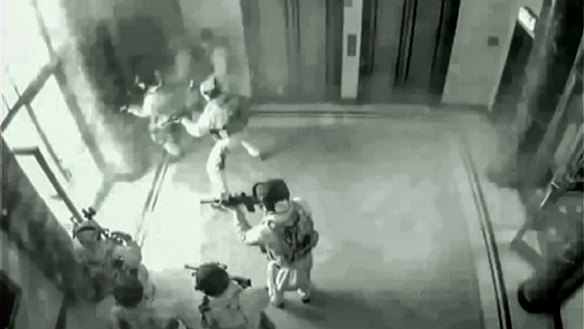 CCTV footage of police entering the Lindt Cafe.