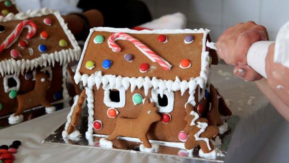 Making a gingerbread house.