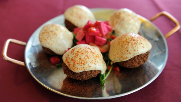 The generous servings at Arabesque include cricket ball-size falafel in a tahini dressing.