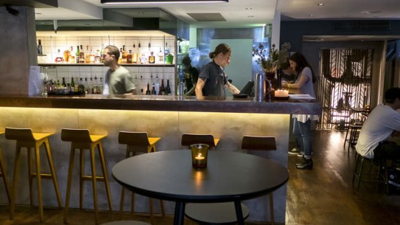 Friendly: A copper-topped bar and a variety of seating make East End Den inviting.