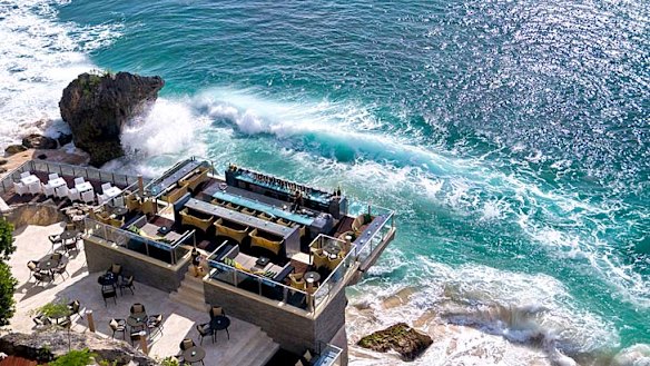 Rock Bar at the Ayana Resort and Spa. The minimalist design of this bar makes perfect use of the rocks on which it sits, just metres above the ocean at the base of towering cliffs.