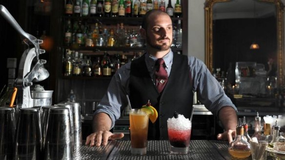 Michael Madrusan, owner of The Everleigh, with two of his non-alcohlic drinks, the debutante and the bramble.