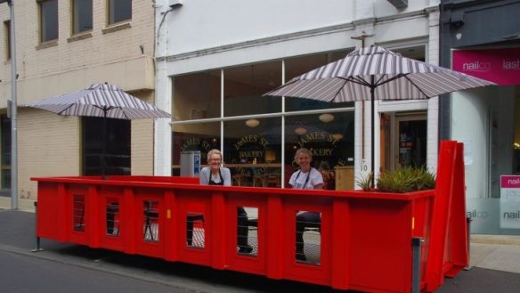 Tip-top idea: Helen and Trish Brosnan in the parklet pod outside their Geelong business, James Street Bakery.
