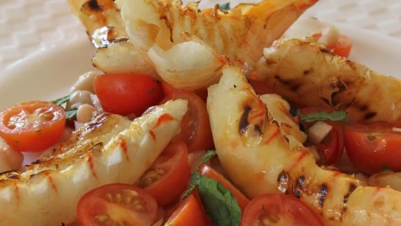 Cherry tomatoes with barbecued prawns.