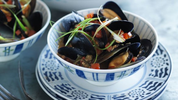 Stir-fried mussels with red bean curd and chillies.