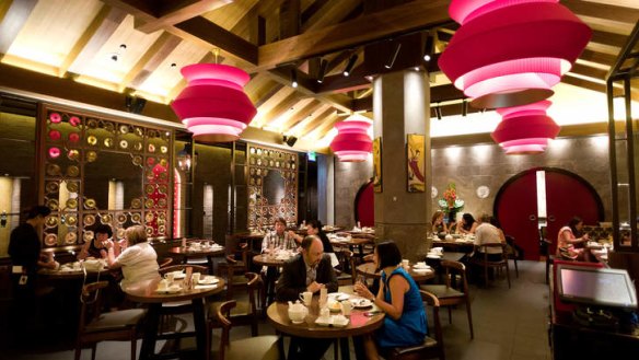 Man Tong is a proper restaurant with a properly expensive fitout of red lanterns, slate, carved screens and Chinese statuary.