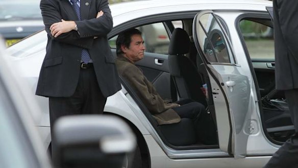 Behind bars: Lucky Gattellari, pictured here while being arrested in 2010