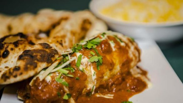 Special chicken with naan bread, and saffron rice.