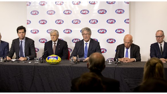 AFL chief executive Gillon McLachlan with (left to right) Kerry Stokes, AFL chairman Mike Fitzpatrick, and Rupert Murdoch as they announce the record-breaking deal.
