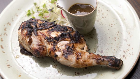 Brick chicken is charred to perfection and served with buttery gravy.
