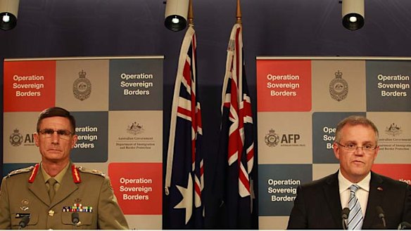 Immigration Minister Scott Morrisson, pictured with Lieutenant General Angus Campbell at a briefing, says he'll no longer hold the weekly press conferences.