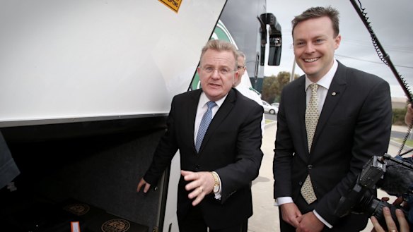Chris Crewther (right) campaigning as a candidate  with former Dunkley MP Bruce Billson.