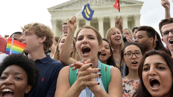 Gay marriage supporters celebrate outside the US Supreme Court in Washington, D.C. on Friday.