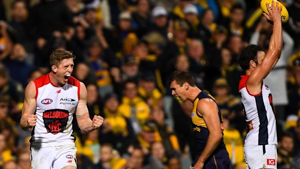 Siren song: Sam Frost celebrates the Demons drought-breaking win out west over the Eagles.