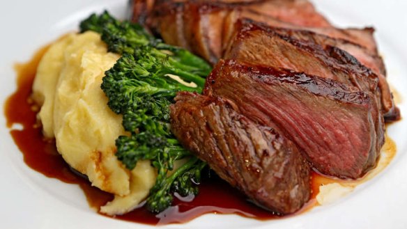 Go-to dish: New York strip steak with jus, broccolini and mashed potato.