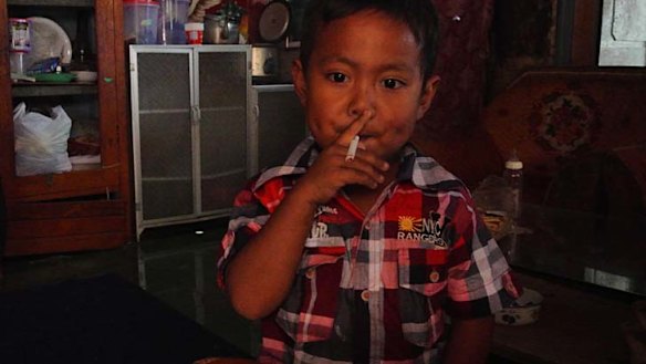 smoke 4 cigarettes a day At 4, he's a pack-a-day happy customer