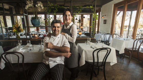 Lanterns add a Middle Eastern look to the restaurant. Pictured are owners Erkin and Ziba Esen.