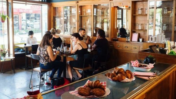 Century-old wooden cabinets and gothic curios decorate the space.