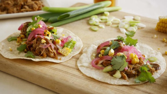 Succulent palate-pleaser: Slow-cooked pulled pork, served on tortillas.