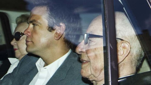 Strength in numbers ... News Corp chief Rupert Murdoch and his eldest son, Lachlan, leave his London home.