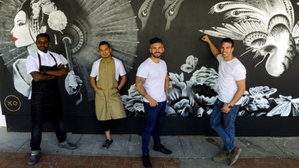 Anand Kumar, Kent Nhan, Greg Lally and Dean Papa outside their new restaurant. 