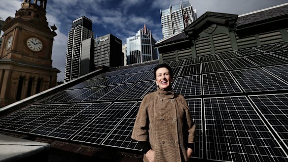 Clover Moore on the roof of Sydney Town Hall.