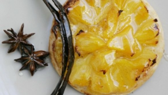 Individual pineapple puff pastry tarts.
