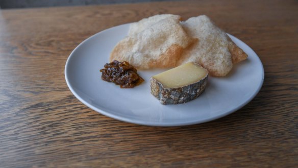 Lucy Whitlow's tomme cheese with onion jam, sourdough crisps.