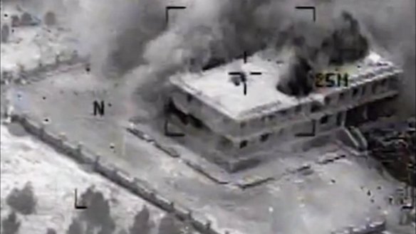 Video released by US Central Command showing a building in Tall Al Qitar, Syria, moments after a US airstrike.
