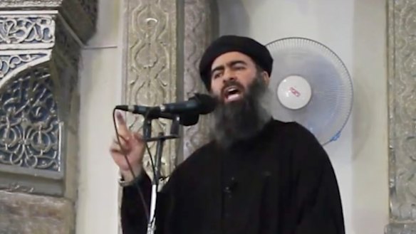 Abu Bakr al-Baghdadi delivering a sermon at a mosque in Iraq in 2014.