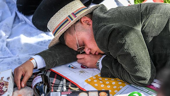 A tired race-goer at the end of the day.