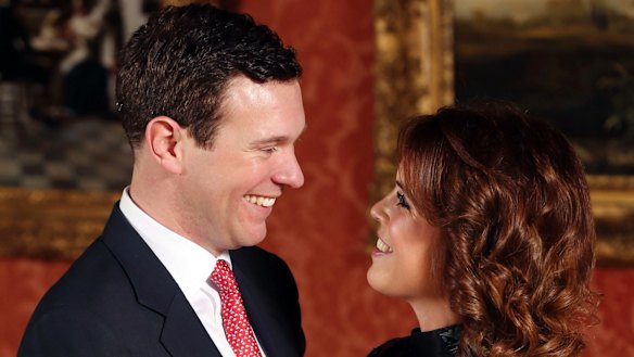 Britain's Princess Eugenie and Jack Brooksbank pose for the media at Buckingham Palace.