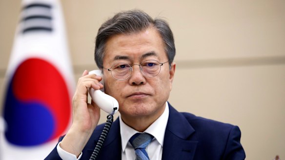 South Korean President Moon Jae-in talks on phone with Japanese Prime Minister Shinzo Abe at the presidential Blue House in Seoul.