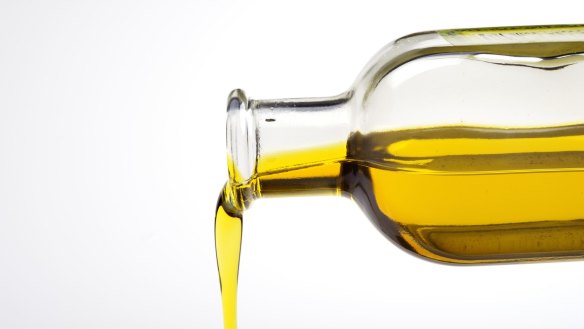 Olive Oil from a bottle Olive oil pouring from a bottle. iStock image downloaded under the Good Food team account (contact syndication for reuse permissions).
