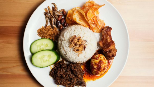 Nasi lemak 'komplit' is a complete lunch.