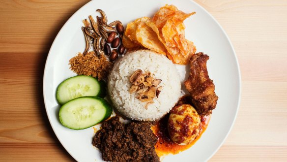 Nasi lemak 'komplit' is a complete lunch.