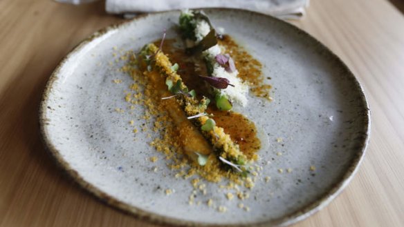 Barbecued greens with dried cheese, marrow and egg yolk.