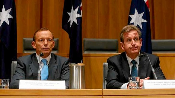 Prime Minister Tony Abbott with NSW Premier Barry O'Farrell during the COAG press conference at Parliament House in Canberra.