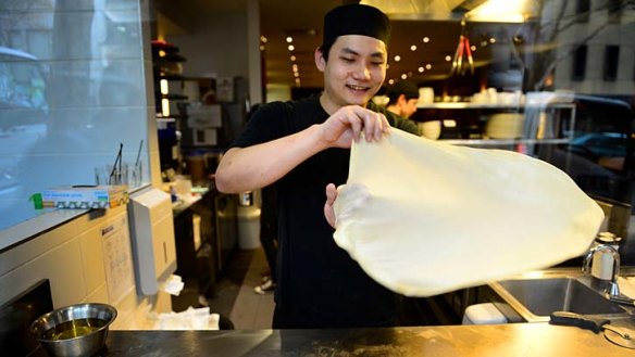 Dany, from city diner Mamak, cooks up some traditional Malaysian Roti Canai.