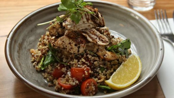 The organic quinoa salad with walnuts, Persian feta, cherry tomatoes and spinach leaves.