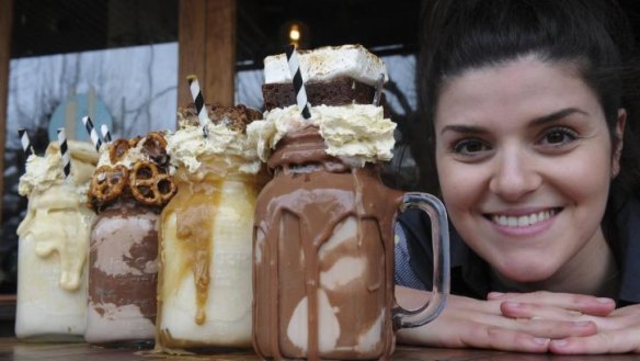 Patissez cafe co-owner Anna Petridis with the four 'freakshakes' she invented.