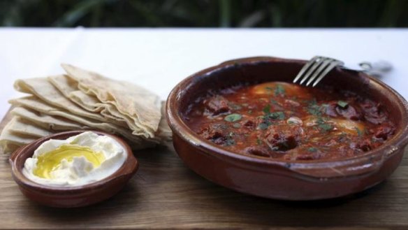 Kafta tagine eggs: Clay pot-baked eggs with spiced lamb kafta tagine.