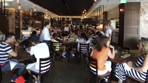 Mercato e Cucina's interior is all polished concrete, dark wood, exposed brick and white tiles.